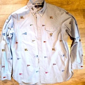 Polo XL Men’s flag shirt yellow, blue and red.